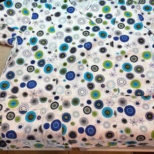 SCRUBS different tops (seasonal/colorful) XL’s and a few solid color bottoms XL